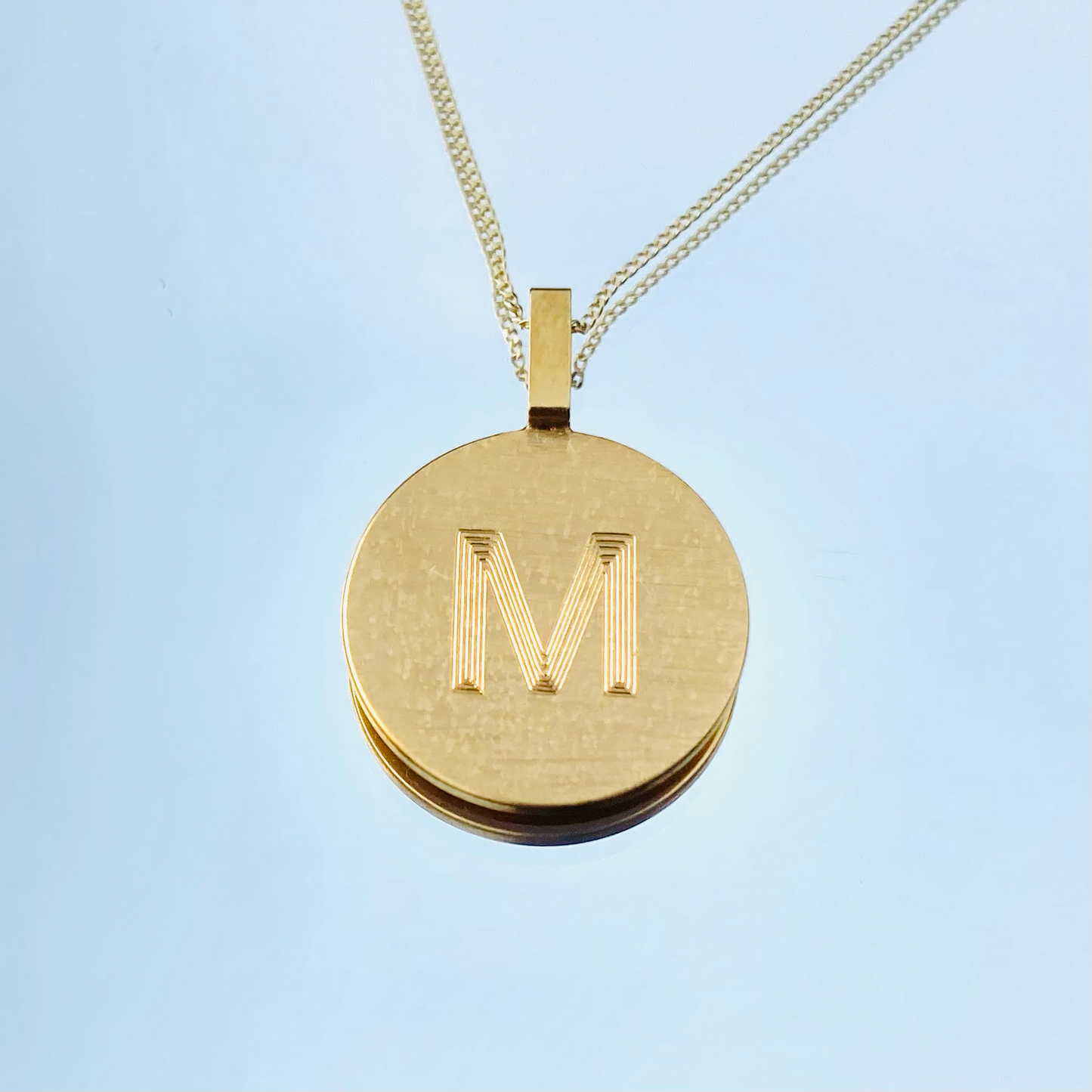 Pendant with single letter