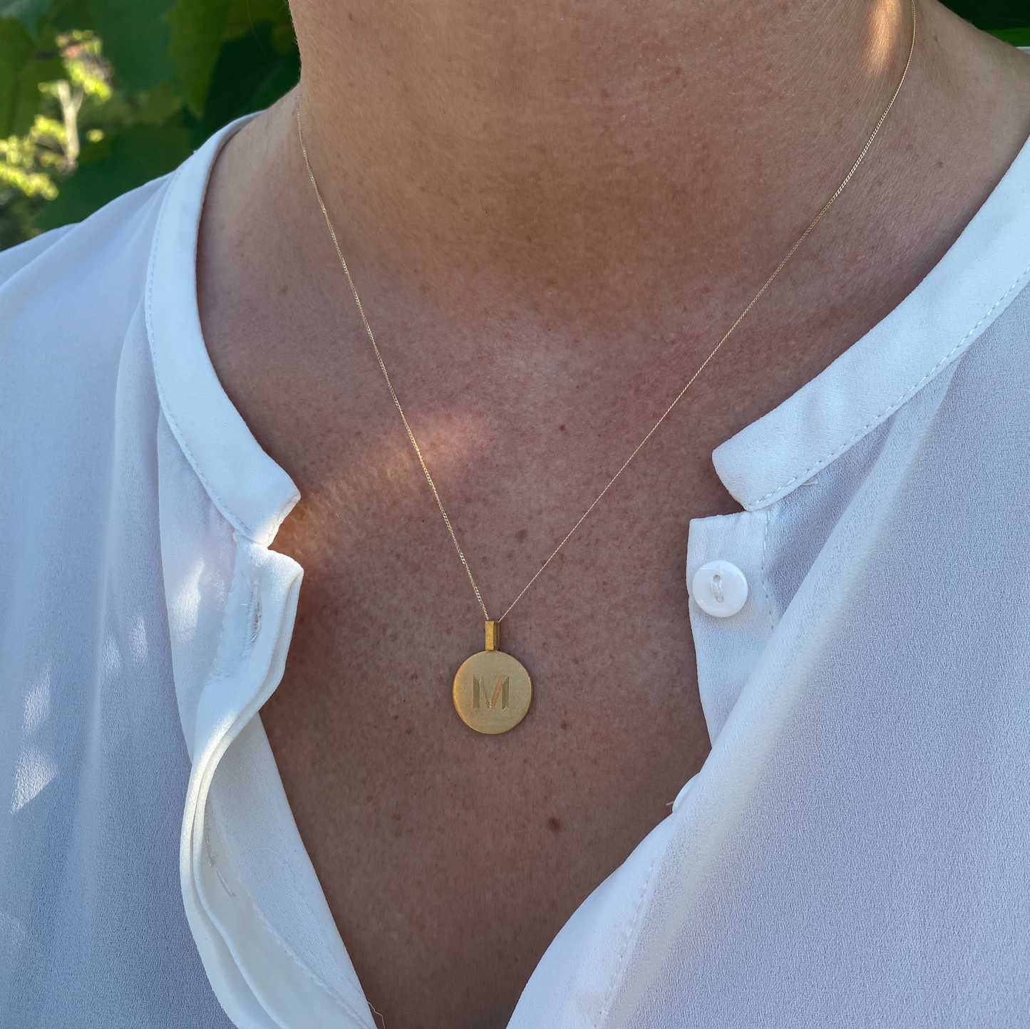 Pendant with single letter