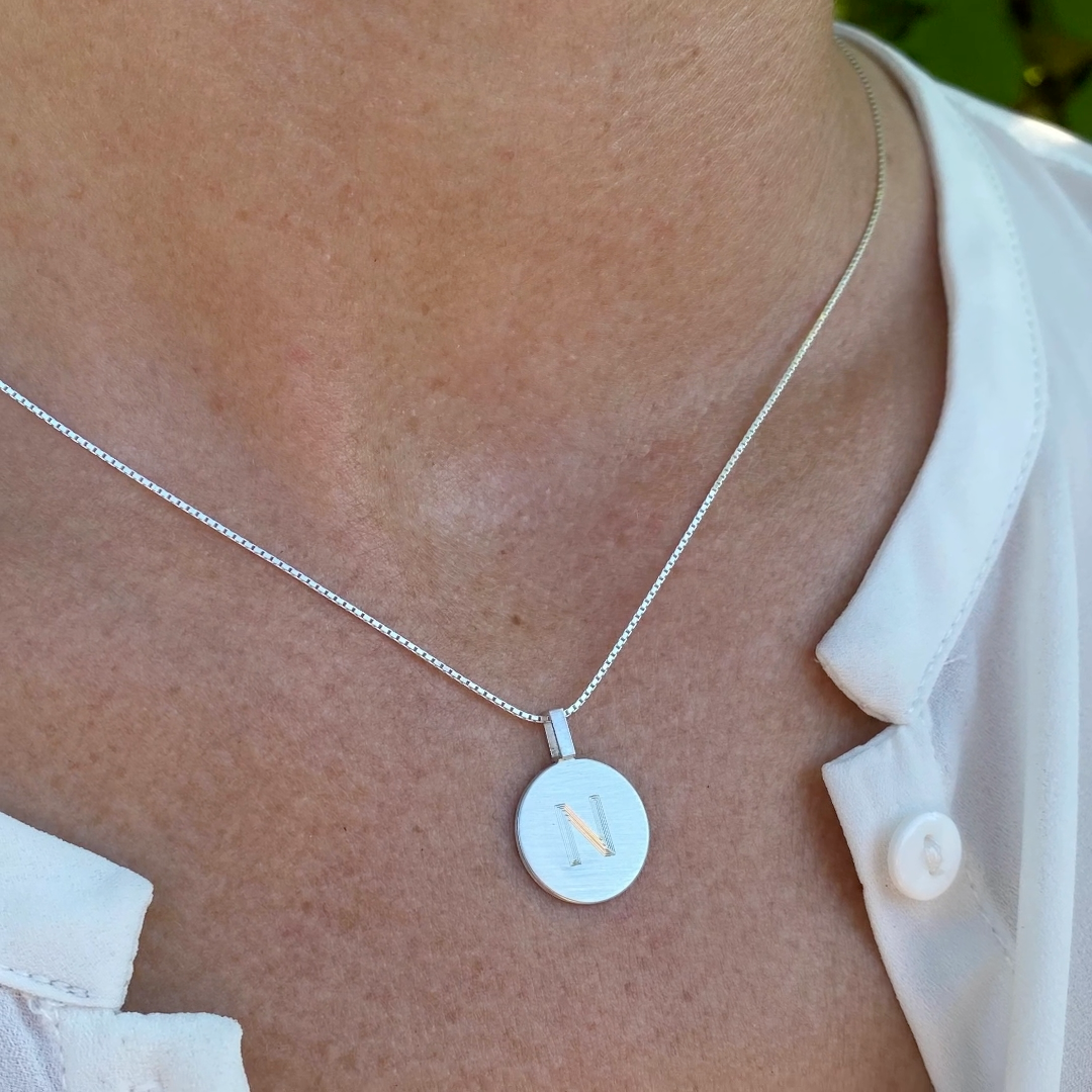 Pendant with single letter