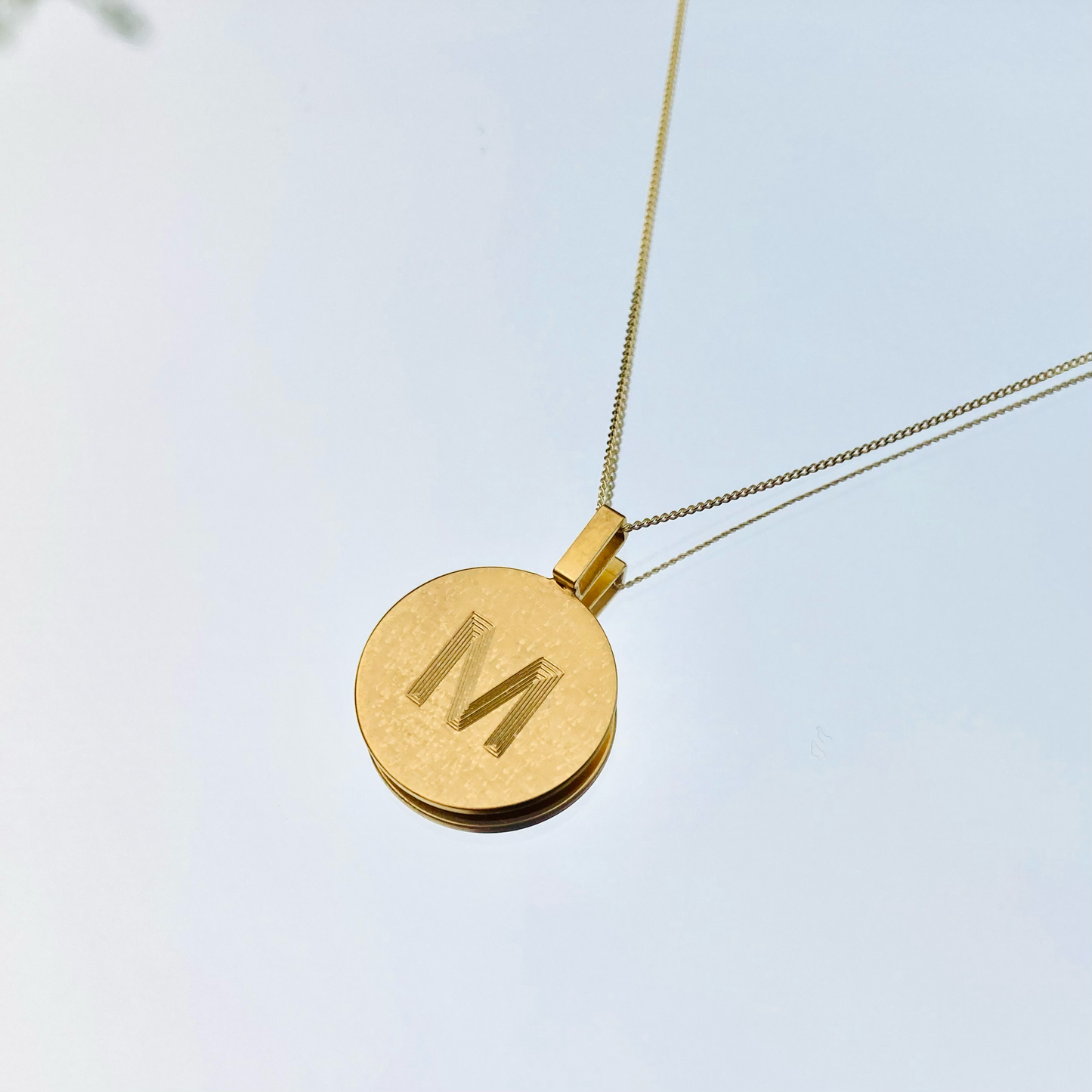 Pendant with single letter