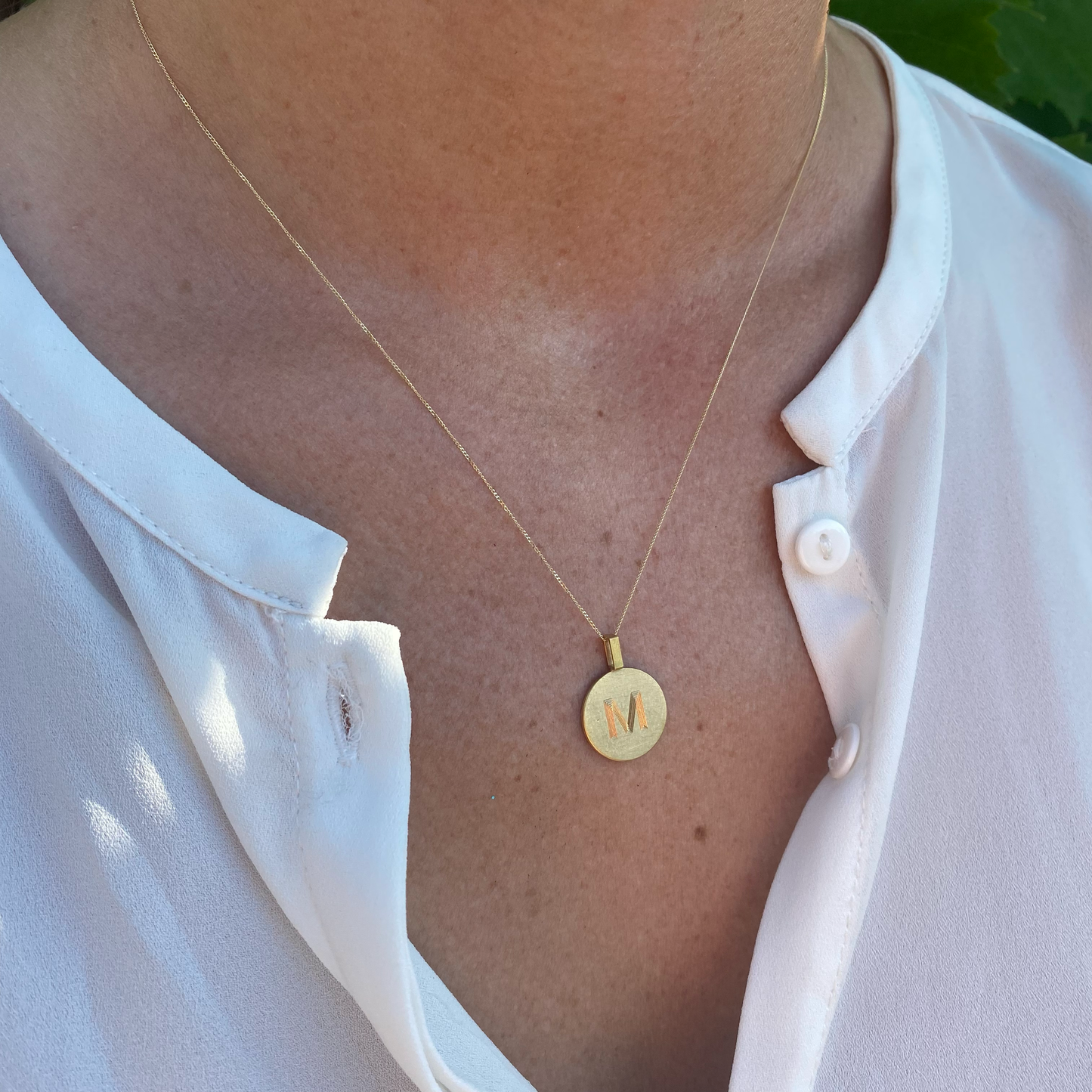 Pendant with single letter